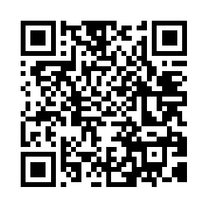 一边的营业员此时已经把包包装袋完毕二维码生成