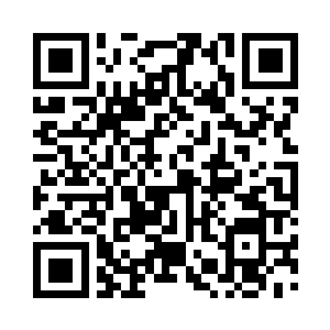 丁羽把洗好的盘子放置到了消毒柜里面二维码生成