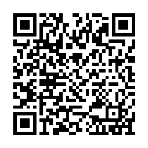 上面还用奇怪的文字写了一个大字的骨质令牌上二维码生成