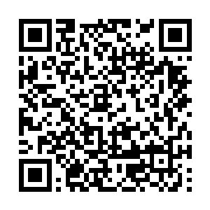 不知道这个中性美女没头没脑的到这边来是干什么二维码生成