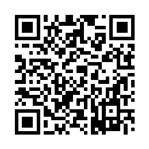 不经意的落在了玻璃窗外的吴敬荣身上二维码生成