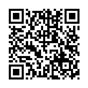 与守卫在这里的工作人员交待了两句二维码生成