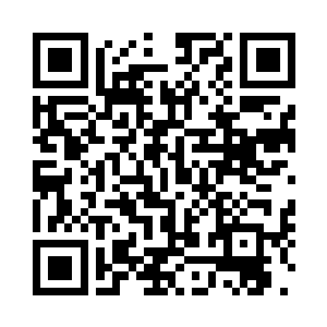 他们对面的这个小男人名叫吴虎臣二维码生成