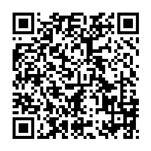 他的声音和曼彻斯特城市球场看台上的曼城球迷高度同步――与此同时二维码生成