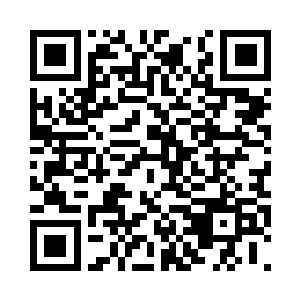 凝神看向那个穿着石油国衣服的女人二维码生成