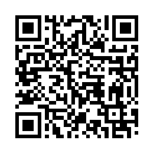 华夏九从另一家名叫千机灵器铺中走出二维码生成