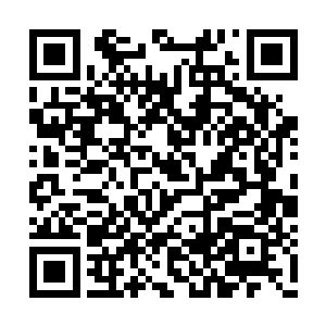 夕纪子讲完之后再次回转身体继续踩着木屐前行二维码生成