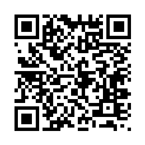 将一束清冷的灯光投射在工作台上二维码生成