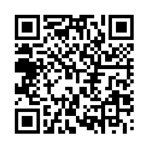 就看到烛光下她一脸凝重的神色坐在那儿二维码生成