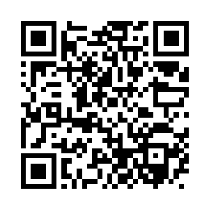 巨大的电子屏播放着全球最奢侈商品的广告二维码生成