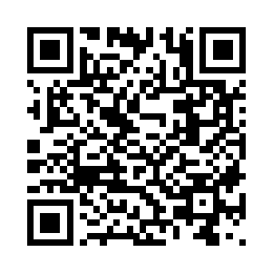 往茶杯中倒了一些黑色的粉末进去二维码生成