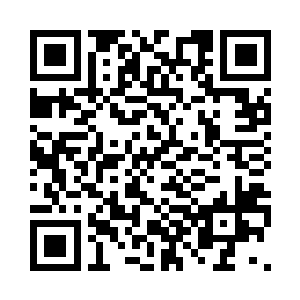 往距离尸体仅两米的一面墙壁上照去二维码生成