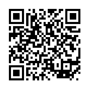 才指着十字路口东北角的店面笑道二维码生成