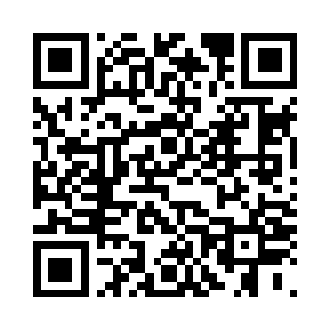 暴喝声中一个身穿黑色夹克衫的壮汉二维码生成