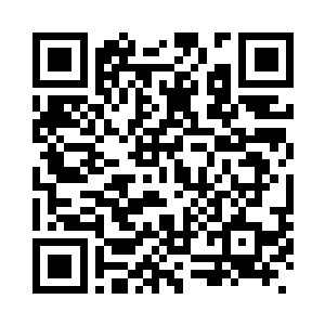 杜克看着对面正装打扮的中年男人二维码生成