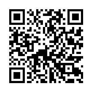 欢喜哥一指小超市里的一个年轻的女售货员二维码生成