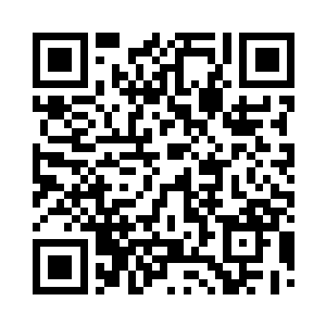 正在乐呵呵和来客交谈的徐堂然一回头二维码生成