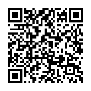炮兵们正在紧张的搬运着炮弹向着日军展开还击二维码生成