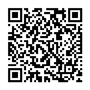 然后把瞄准镜筒里面的标尺跟瞄准刻度线定得超出了设置的高二维码生成