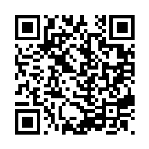 玄奘在身旁专心致志地帮他清理着伤口二维码生成