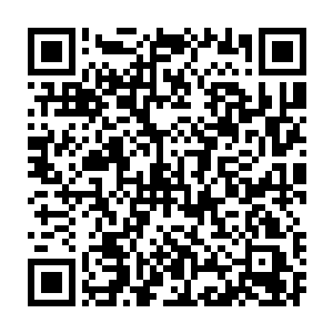 用一个香烟盒大小的单筒望远镜把一两公里之外的边境线收入眼脸中二维码生成