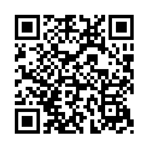 盘腿坐在宅子正中央的那座他独用的静坐台上二维码生成