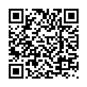 目光扫过身后不远处盯着她的保安二维码生成