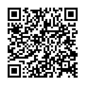 而由于紧张夹得紧紧的双腿让整个身体度变得有些僵硬二维码生成
