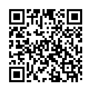 而那位谭校长则迎向了其中一名中年男子二维码生成