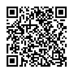 被一个看上去像是个刚刚大学毕业的学生躲过了二维码生成