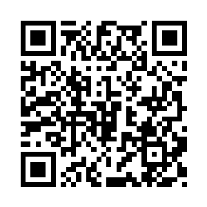 那被称之为奥黛丽的年轻女子微微一笑二维码生成