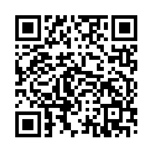里边正有一个妇人和一名老人在交谈二维码生成