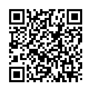 长子和其余几十名身穿通信兵制服二维码生成