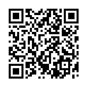 阿布杜勒阿齐兹的脸上现出了复杂之色二维码生成